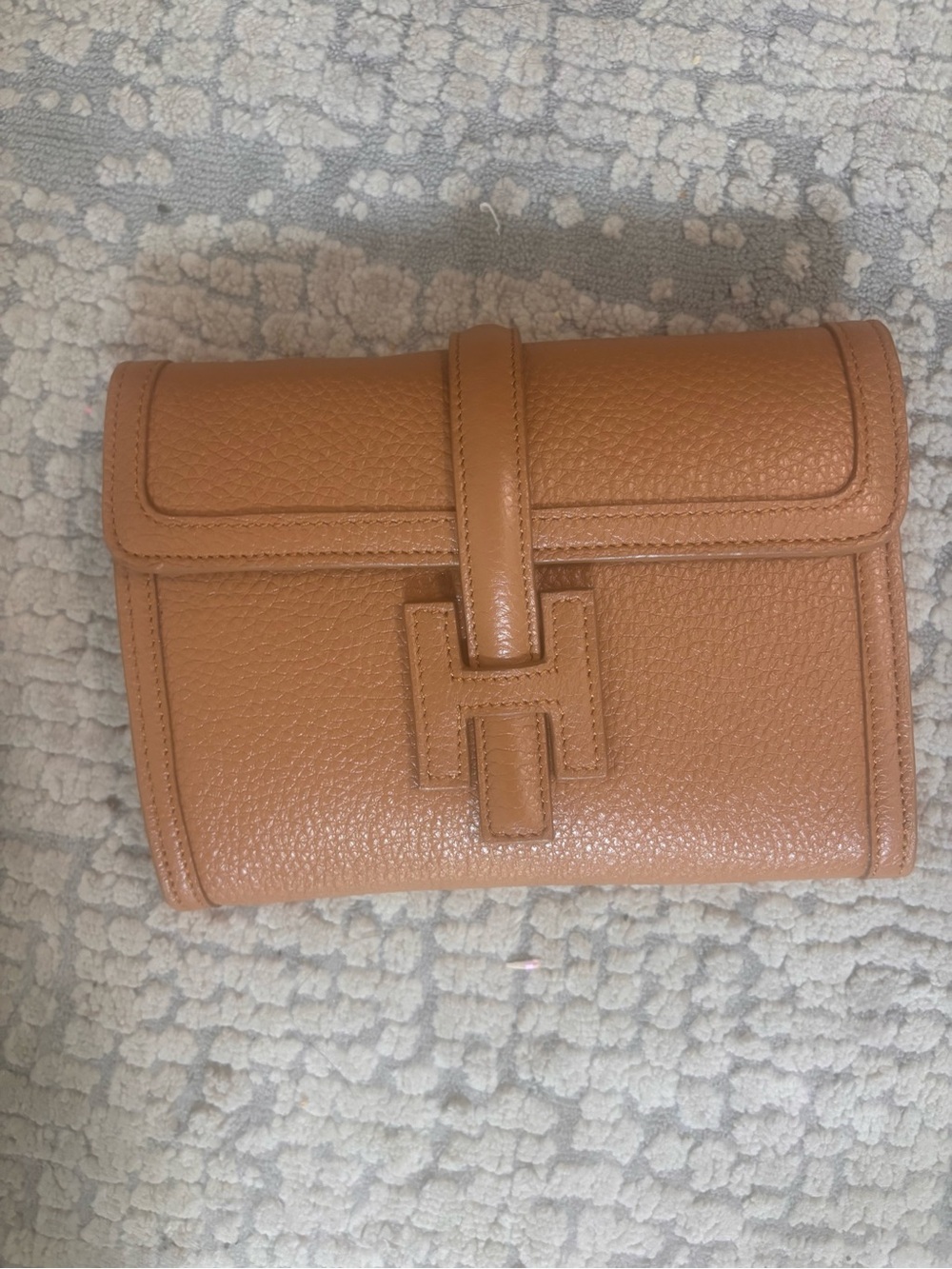 Tan leather clutch